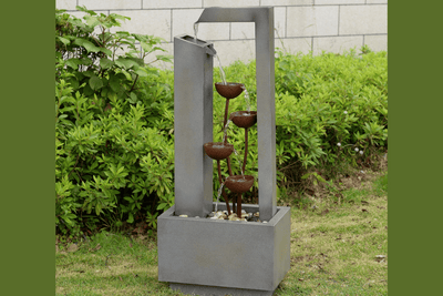 Decorating Around a Yard Fountain: Benches, Planters & Lighting Ideas