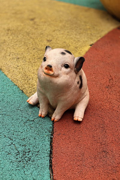75617-F - Sitting Pig Looking Up Hi-Line Gift Ltd.