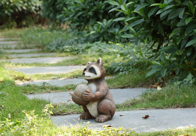 Racoon Holding Acorn Statue HI-LINE GIFT LTD.