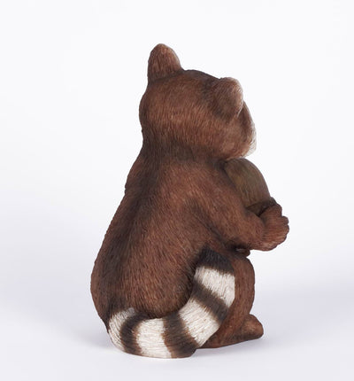 Racoon Holding Acorn Statue HI-LINE GIFT LTD.