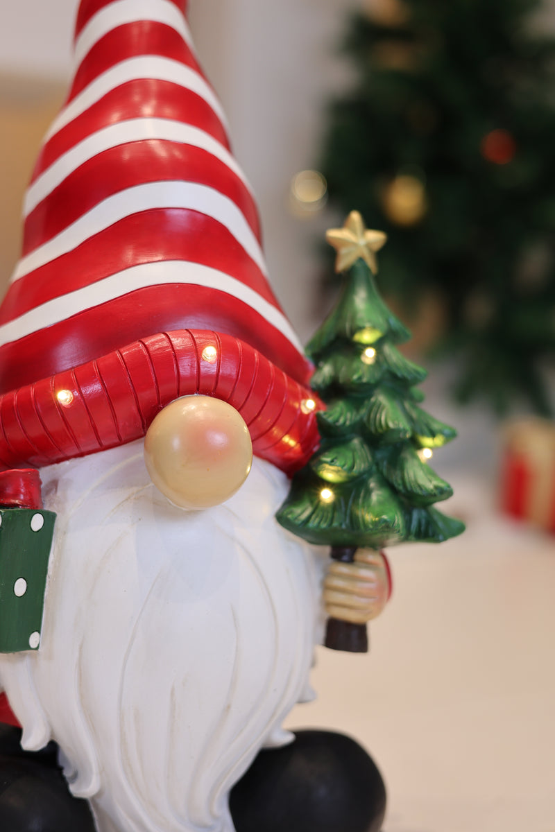 85188-C - Santa Holding Christmas Tree Lighted Christmas Decor Battery Operated Indoor Use Only Hi-Line Gift Ltd.