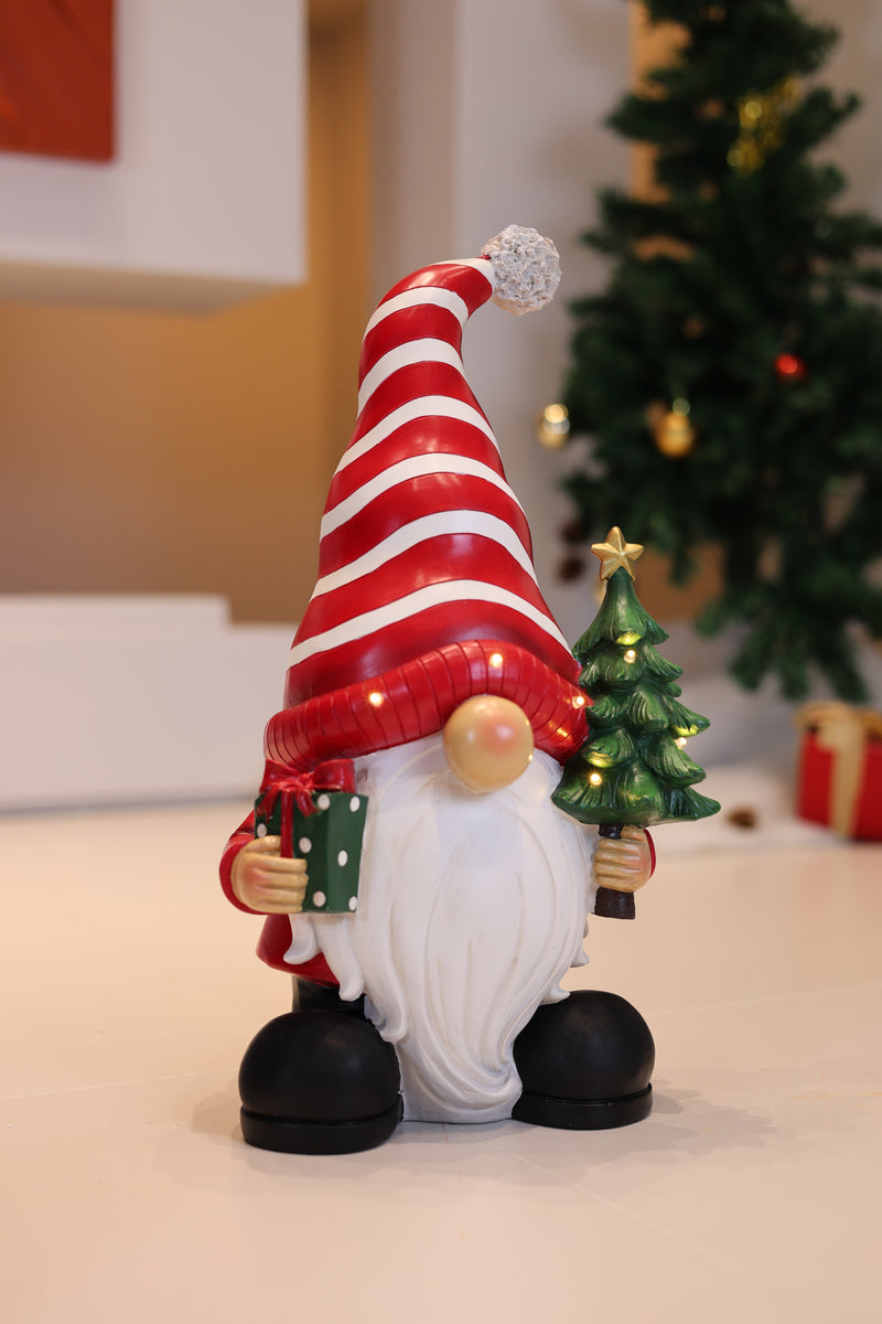 85188-C - Santa Holding Christmas Tree Lighted Christmas Decor Battery Operated Indoor Use Only Hi-Line Gift Ltd.