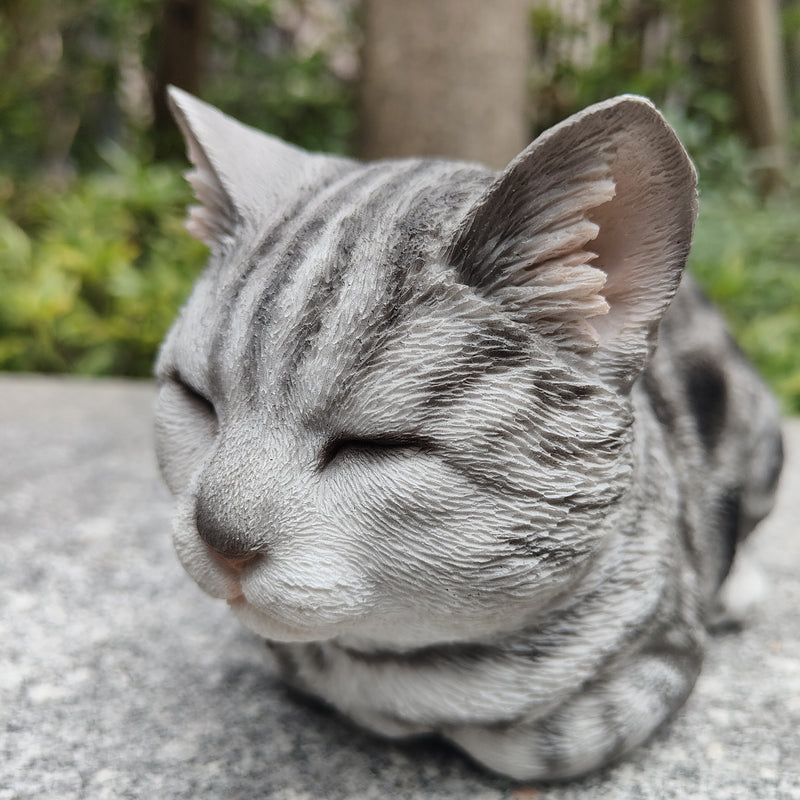 87729-D - Tabby Tranquility: Whimsical Black Polyresin Napping Cat Figurine Hi-Line Gift Ltd.