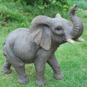 Elephant with trunk up statue