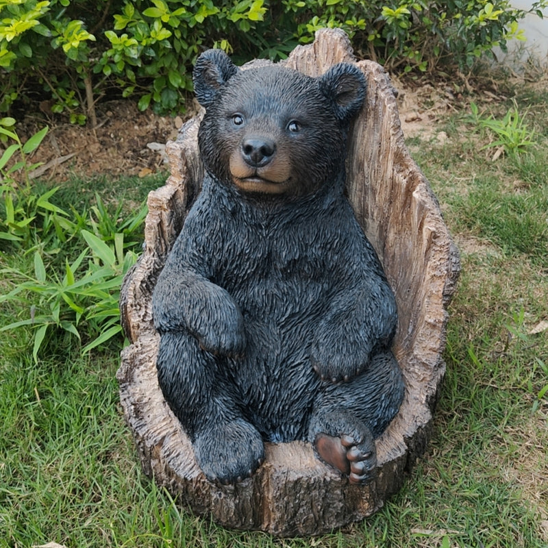 87957-M - Lone Cub Haven: Intriguing Black Polyresin Bear in Stump Figurine Hi-Line Gift Ltd.