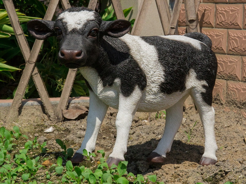 Cow Standing Black and White Statue HI-LINE GIFT LTD.