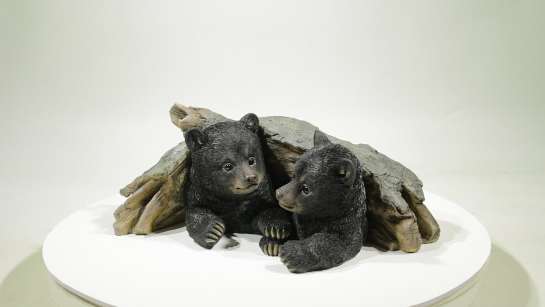Black Bear Cubs Hiding Under Log Statue
